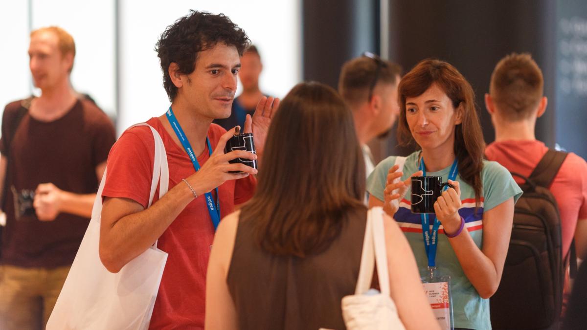 Hanging out during welcome drinks at Web Summer Camp 2018